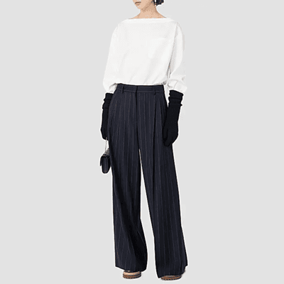 woman wears navy blue flannel pants