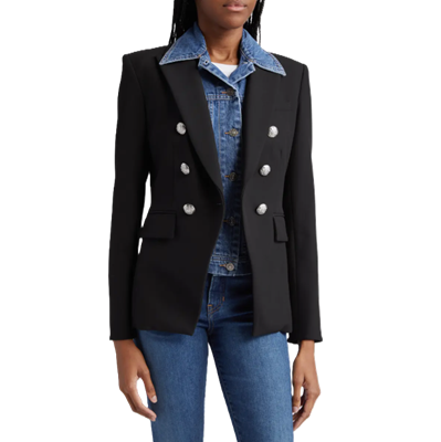 woman wears black blazer with a blue denim collar and plackard that is actually a dickey (not a full denim jacket)