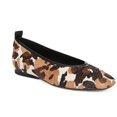 A ballet flat with cowhide print