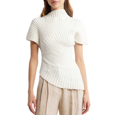 woman wears white knit top with unusual ribbed details