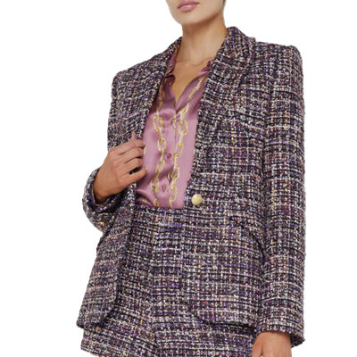 woman wears purpley pink tweed blazer with pinkish blouse