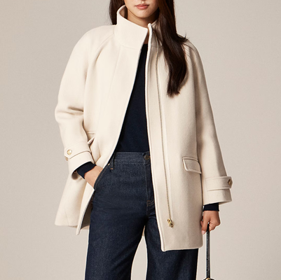 woman wears white professional winter coat for women