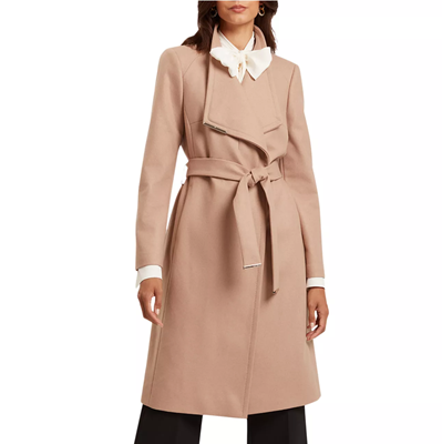 woman wears beige professional winter coat for women