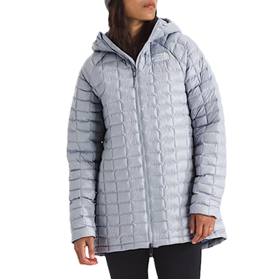 woman wears silver washable coat