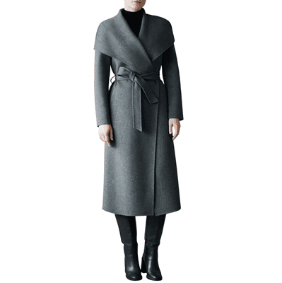 woman wears gray wrap coat