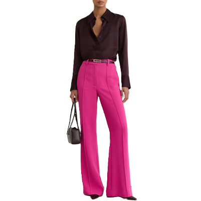 woman wears hot pink pants with dark burgundy blouse