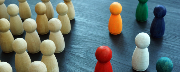diversity & inclusion concept with wooden and colored figures