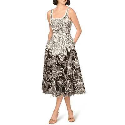 beautiful cream and black embroidered dress with pockets