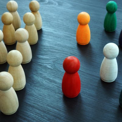 diversity & inclusion concept with wooden and colored figures