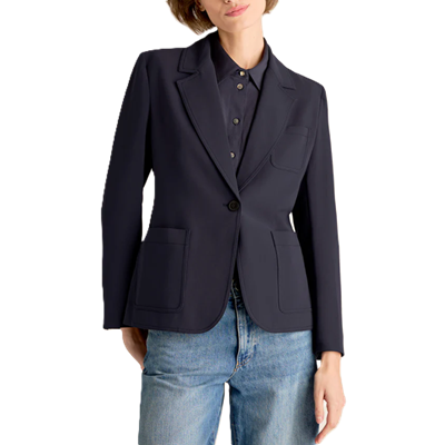 woman wears navy blazer with patch pockets