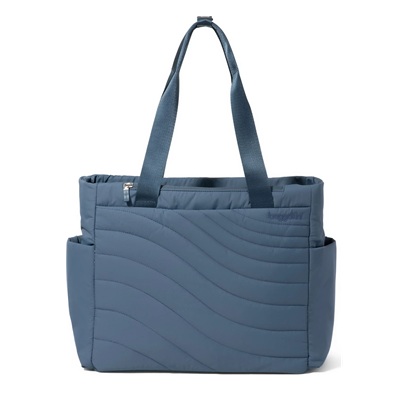 A slate blue totebag with a quilted texture
