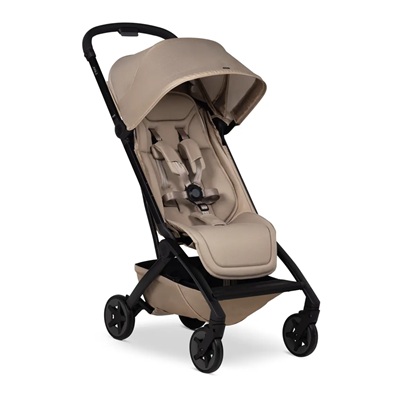 A brown and black stroller for travel