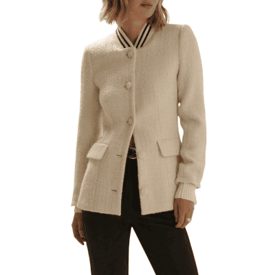 woman wears stylish cutaway collarless blazer
