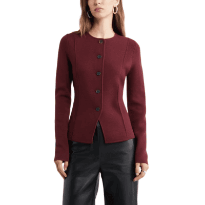 woman wears stylish cutaway collarless blazer