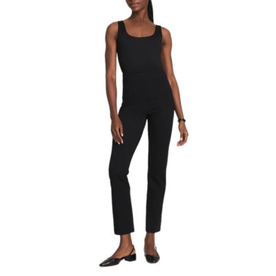 woman wears black pants and black tank