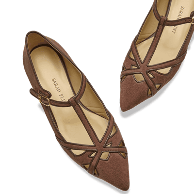 brown pointy-toed T-strap flats with latticework on vamp