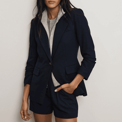woman wears blazer with merino dickey insert (with shorts? i don't get it either)
